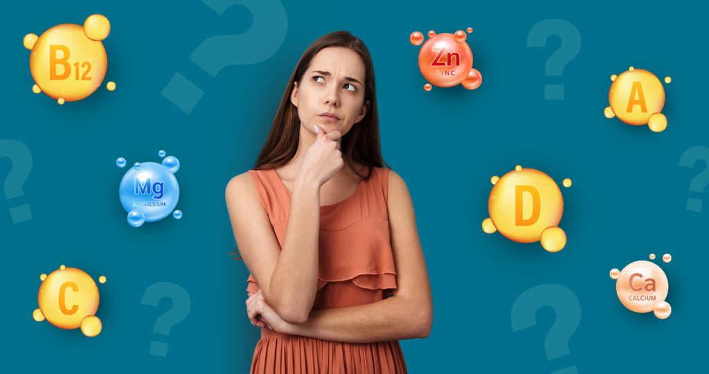 Woman thinking surrounded by vitamins and minerals 